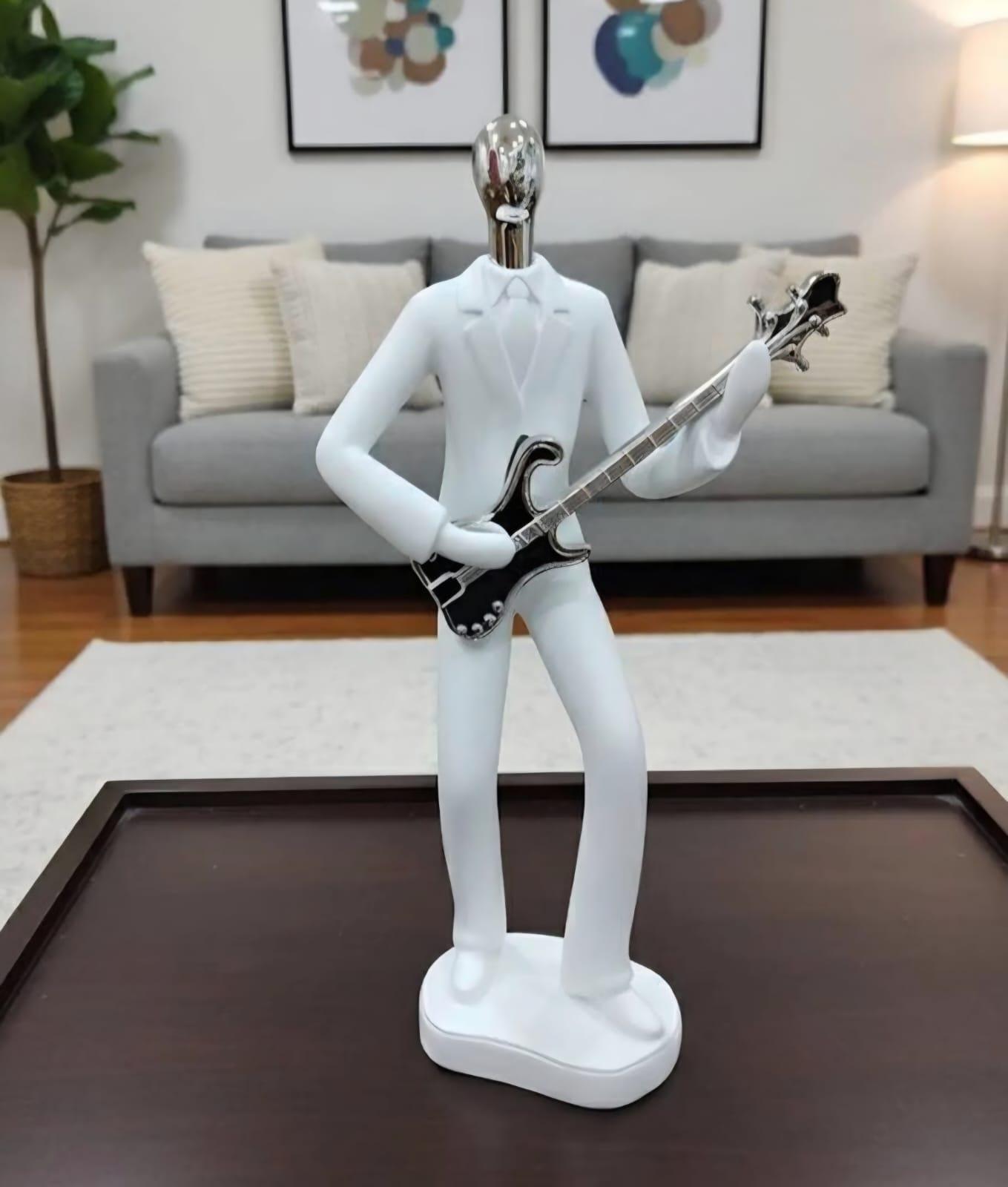 Statue guitariste blanc, tête argentée