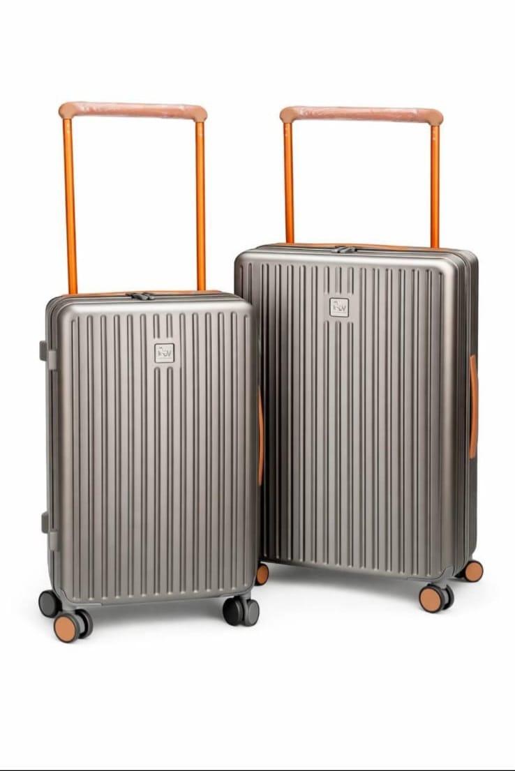 Valises rigides avec détails contrastés