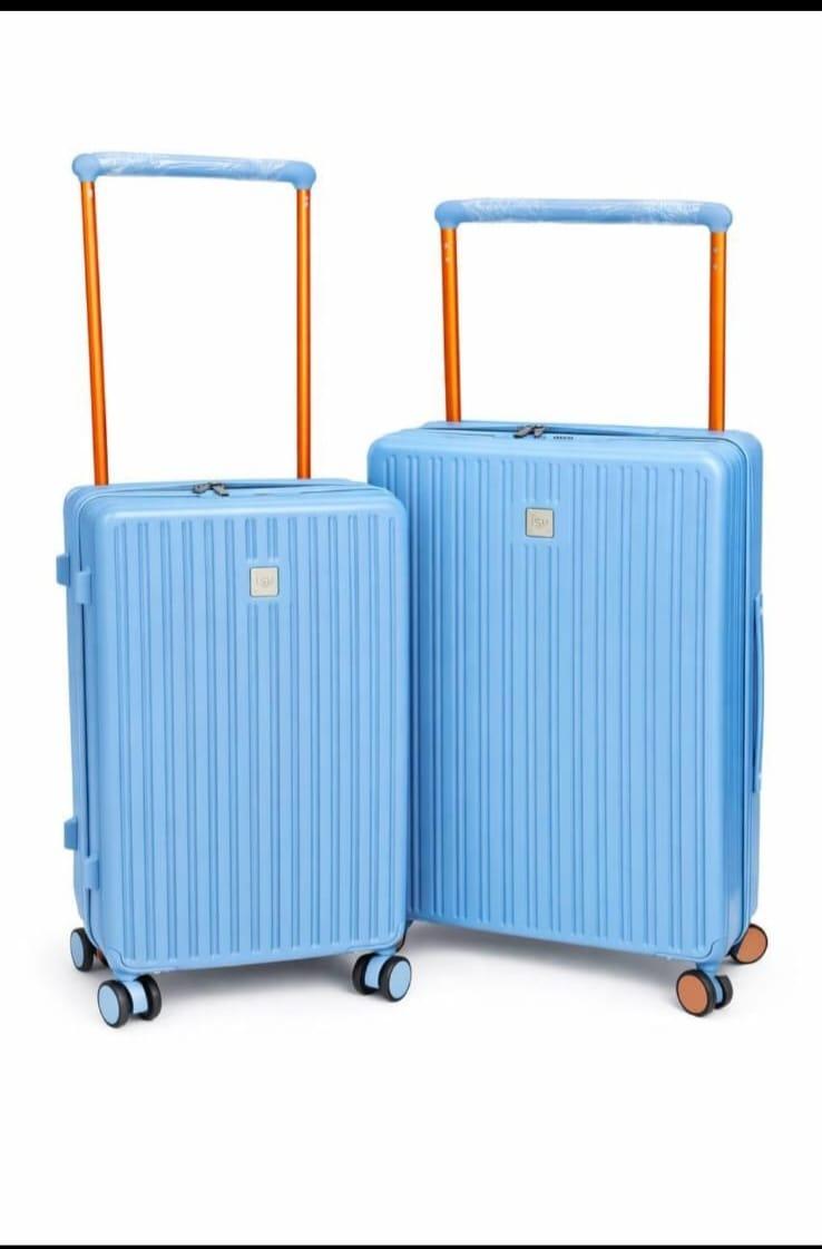 Valises rigides avec détails contrastés